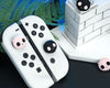 GeekShare Light Pink and Black Skull Thumb Grips - Switch, Switch OLED, Switch Lite